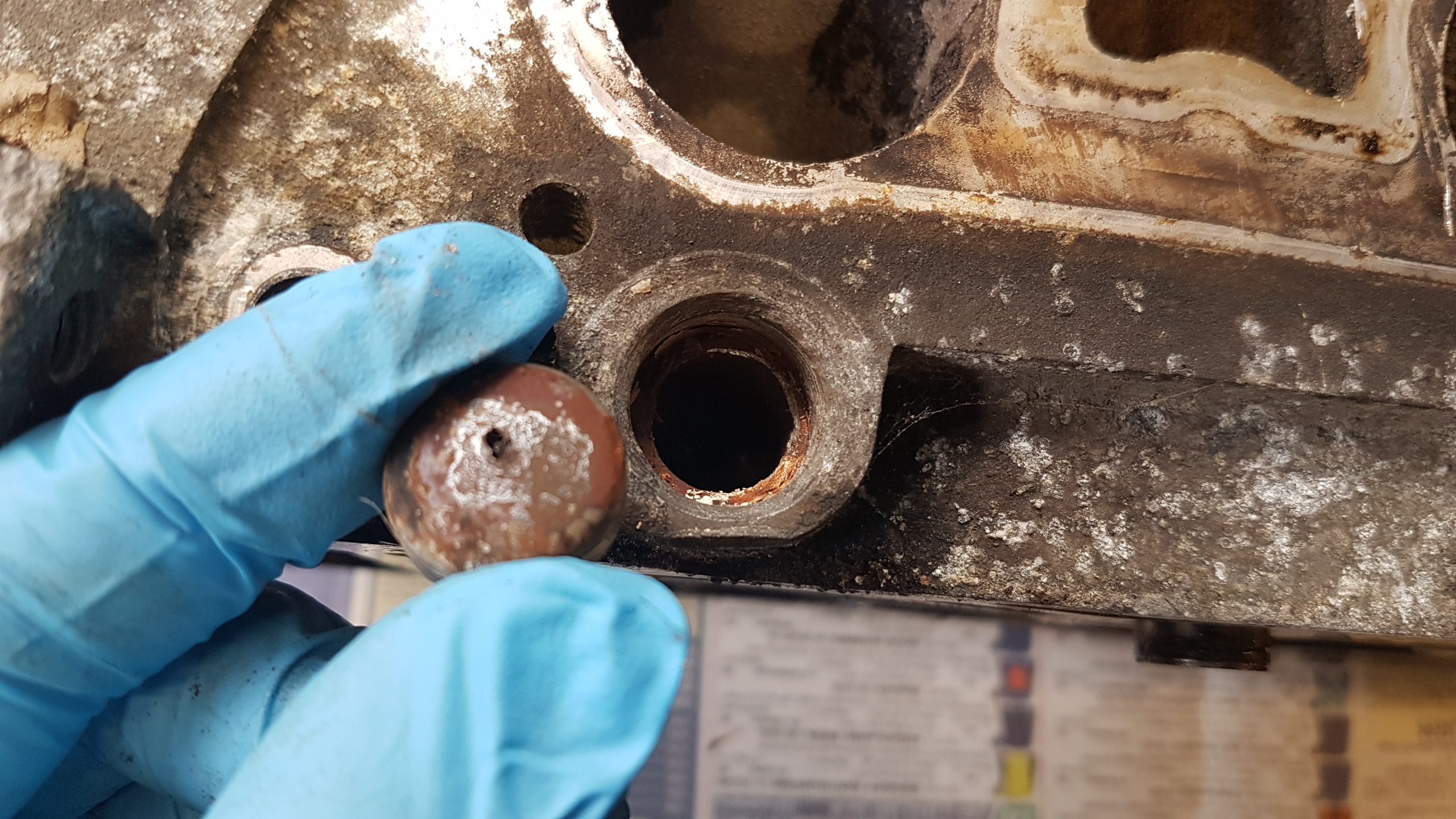 rusty leaking core plug in cylinder head
